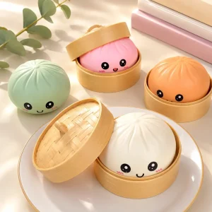 Squishies dumpling pastel dans leurs paniers vapeur - Planete Jouets France