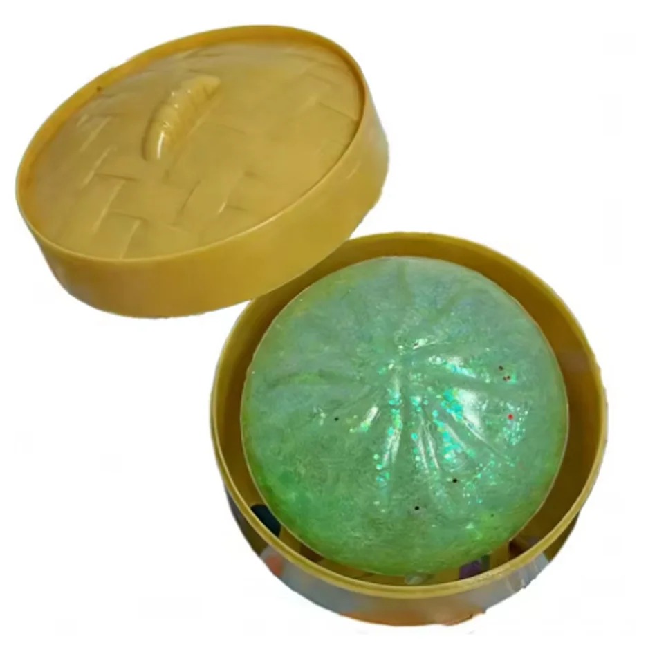 Boutique Planete Jouets France - Blind Box Squishy Dumpling Pailleté – 12 Couleurs à Collectionner 6 Squishy dumpling vert pailleté dans son mini panier - Planete Jouets France